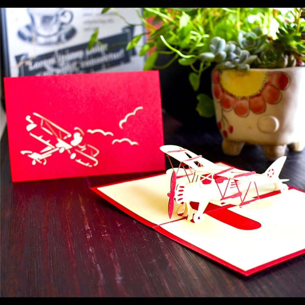 A set of 5 Red 3D Airplane greeting cards. Individually packed
